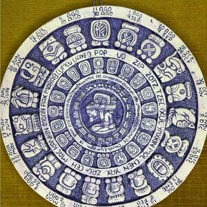Intricate Purple and White Mayan Calendar Art